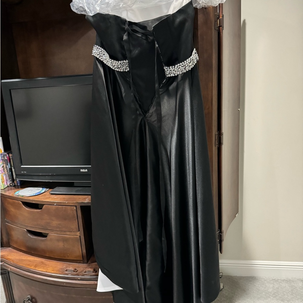 Black formal gown. Only worn once. Perfect condition